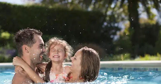 Family enjoying their pool